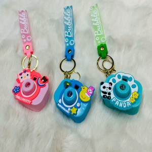 Creative Projection Camera Cute Keychain Pendant Fashion Bag Decoration Gifts SUPER BABY   1. Innovative Design: The design of the Sanrio Projection Camera Keychain is derived from the shape of a photography camera, incorporating technological elements. T